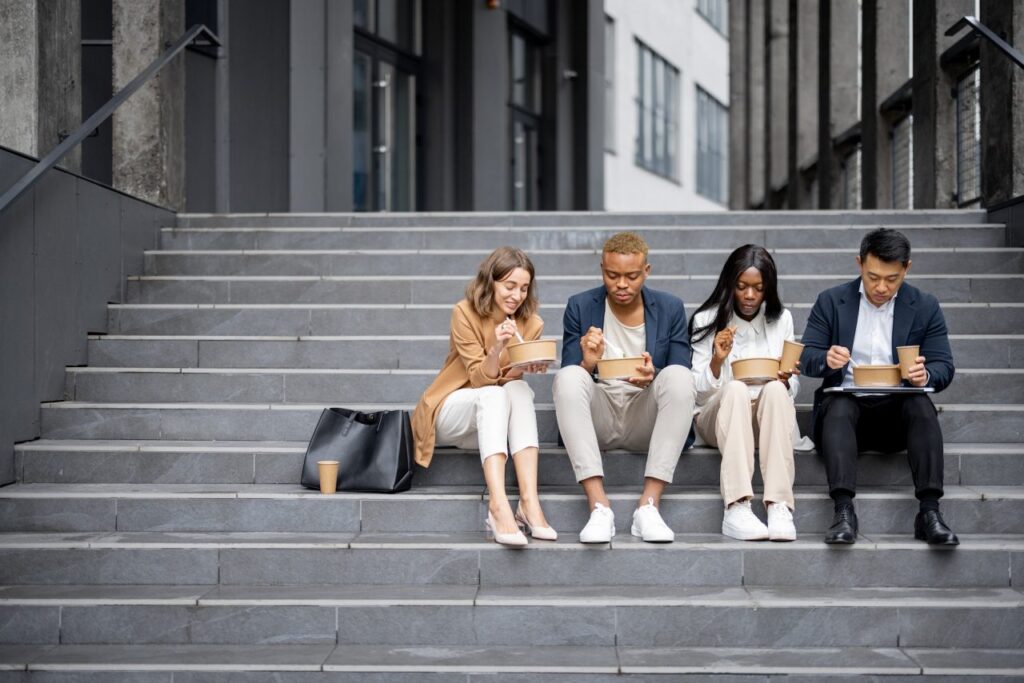 CSA business-team-talk-eat-and-drink-on-stairs.jpg
